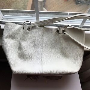 White hand bag